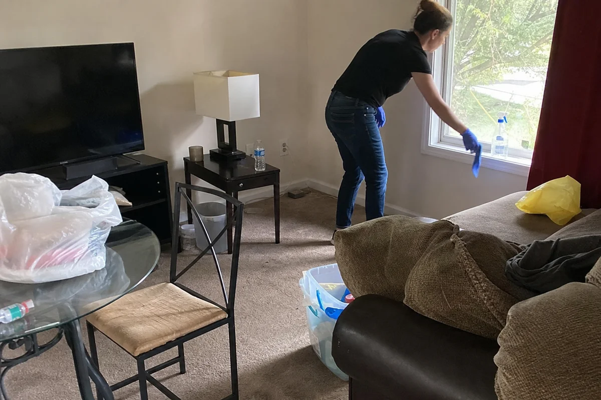 EPA-registered disinfectant application during cleanup